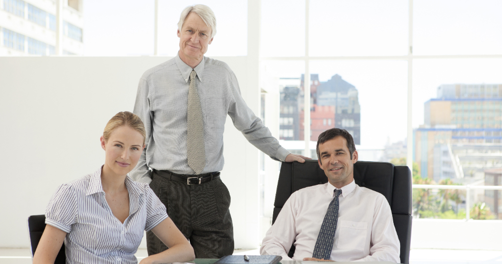 Business colleagues sitting at a conference table